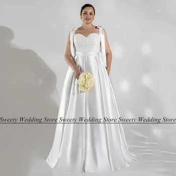Потрясающее свадебное платье с корсетом, плюс размер, без рукавов, с кружевным бантом, со шлейфом, Атласное свадебное платье А-силуэта с карманом